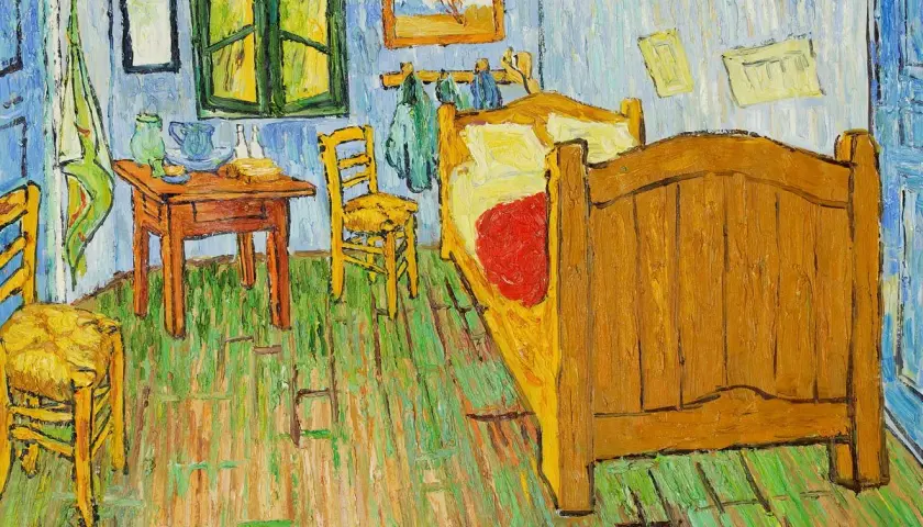 Sypialnia Van Gogha, jeden z jego najsłynniejszych obrazów. Proste meble, jaskrawe kolory, poczucie spokoju.
